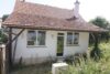 „STATTLICH WOHNEN IM HOLZHAUS-CHARME“ DHH MIT GÄSTEHAUS UND CARPORT IN 94428 EICHENDORF - Ansicht Gästehaus